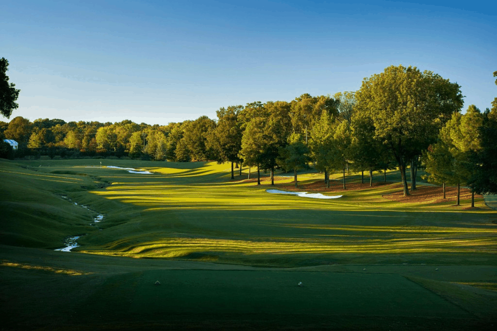 The 18th hole at Quail Hollow Club &mdash; par 4, 494 yards, creek running the entire left side